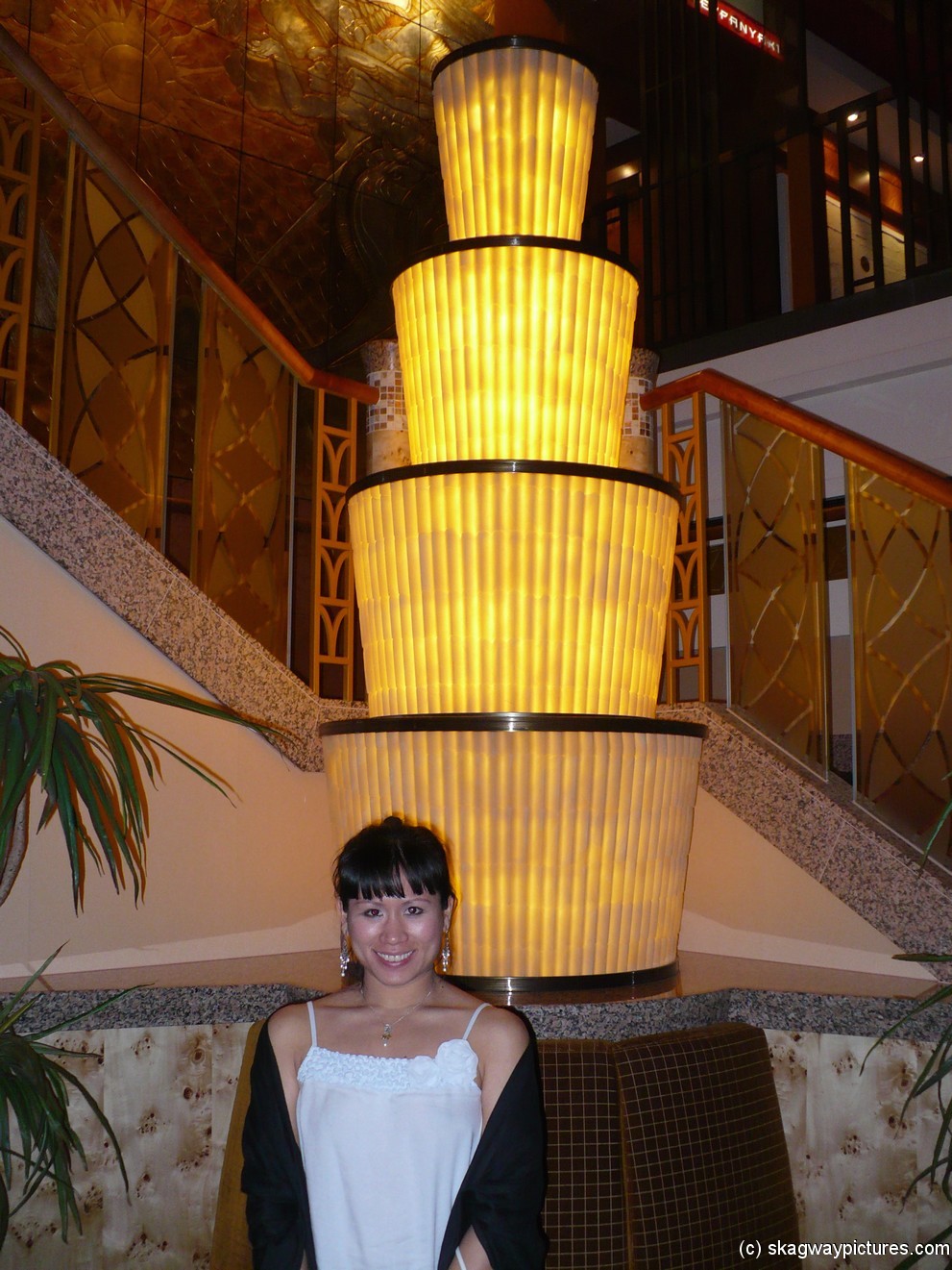 Joann and a light column aboard the NCL Pearl.jpg