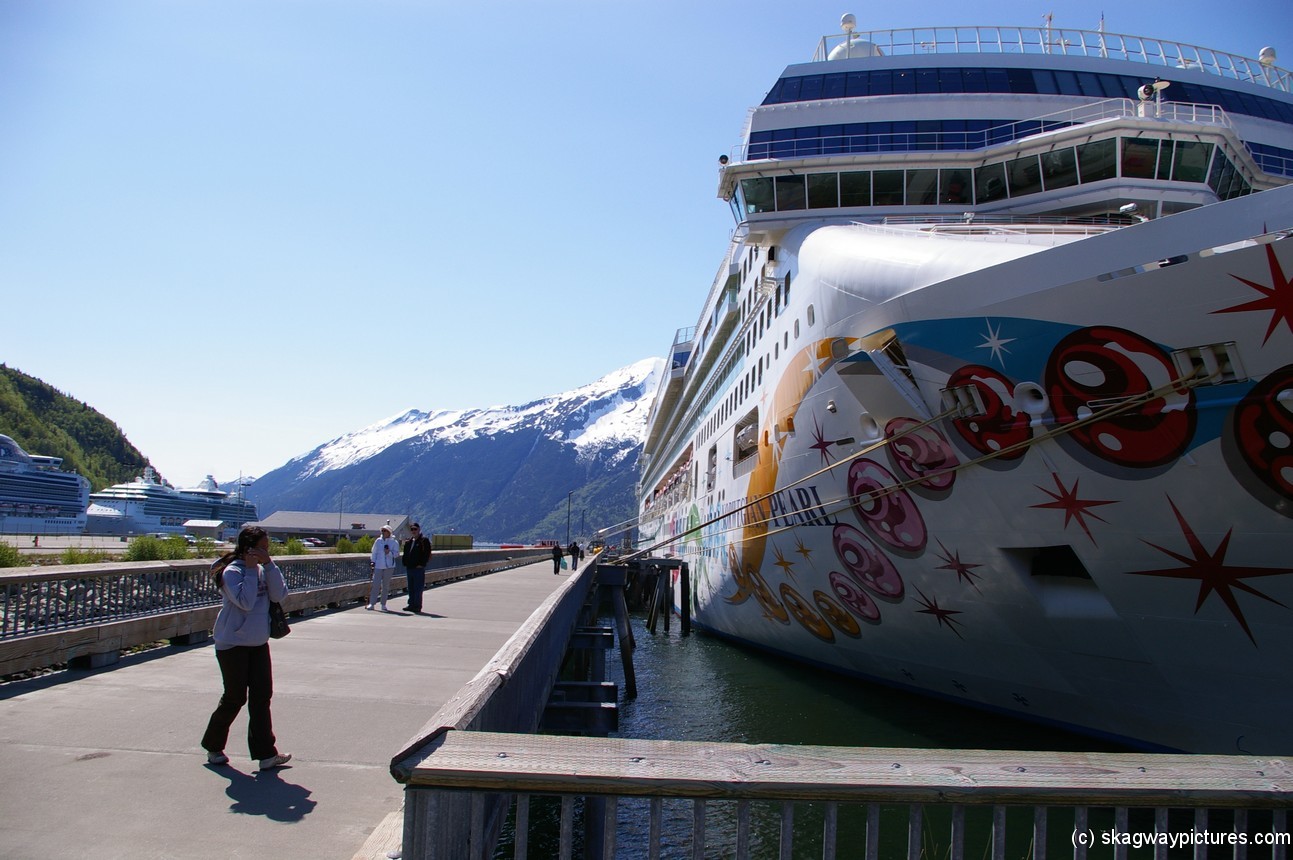 NCL Pearl cruise ship docked at Skagway.jpg