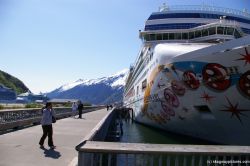 NCL Pearl cruise ship docked at Skagway.jpg
