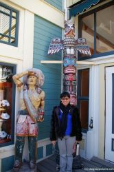Joann and in front of a totem pole in Skagway.jpg