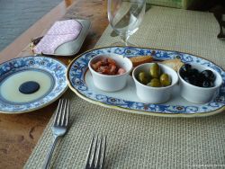Olives and tomatos plate at La Cucina restaurant aboard the NCL Pearl.jpg
