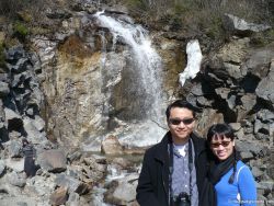 David and Joann in front of waterfall in Skagway Alaska.jpg